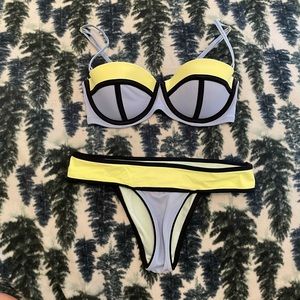 Victoria’s Secret bikini; 32D; XS